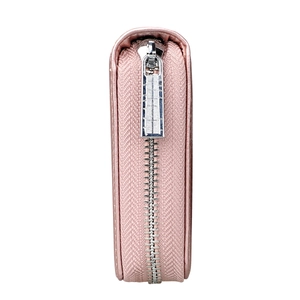 Side view of pink leather accordion passport wallet showing smooth texture and metal zipper