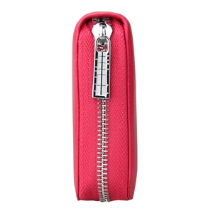 Detail of rose red leather passport holder featuring a unique silver ruler zipper pull