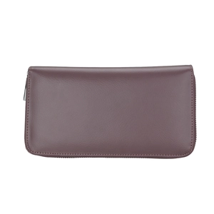 Detail of dark purple leather wallet featuring high-quality grain and wraparound zipper