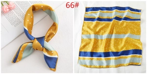 Detail of 50x50cm silk scarf featuring mustard yellow stripes with white polka dots