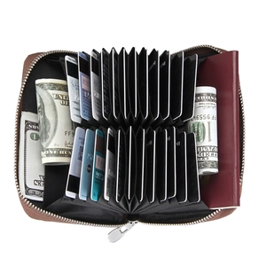 Macro view of brown leather RFID card holder with multi-slot accordion style organizer