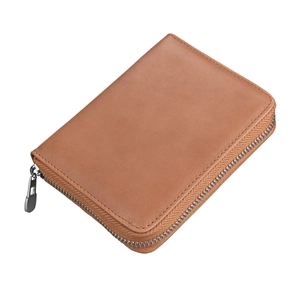 Close-up of a brown leather RFID card holder with a sturdy metal zipper and multi-slots