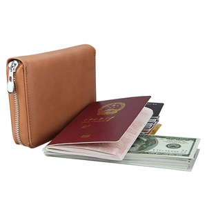 Brown leather RFID passport wallet with zipper detail and multi-card storage capacity
