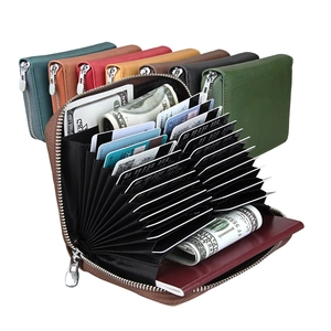 Detailed view of internal multi-card slots and passport compartment in a leather wallet