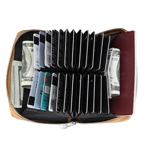 Detail view of RFID leather wallet showing accordion card slots and passport storage
