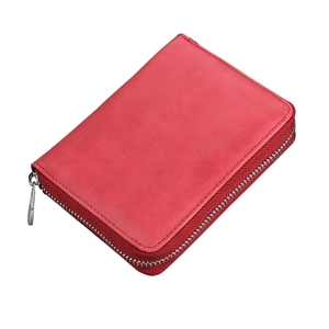 Detailed close-up of red leather RFID card wallet with durable stitching and secure zipper