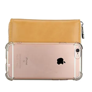 Detailed view of brown leather RFID wallet showing large capacity for smartphone storage