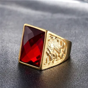 Mens dragon gold ring with rectangular red gemstone and intricate relief carving