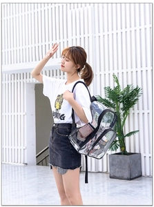 Detailed view of waterproof transparent PVC backpack with reinforced black webbing edges