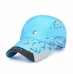 Detail of sky blue outdoor sports baseball cap with quick-dry fabric and side graphics