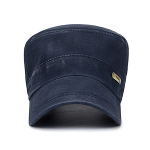 Distressed navy blue cadet cap with vintage canvas texture and gold metal plaque