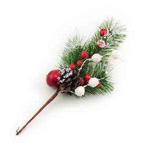 Artificial Christmas pine branch with red berries and snowy pinecone holiday decor