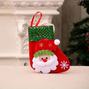 Red Christmas stocking with 3D Santa Claus and green sequin cuff for festive decor