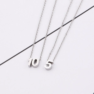 Polished silver stainless steel Arabic number necklaces showing digits 10 and 5