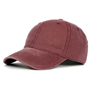 Classic washed cotton baseball cap in vintage burgundy with six-panel design and curved brim