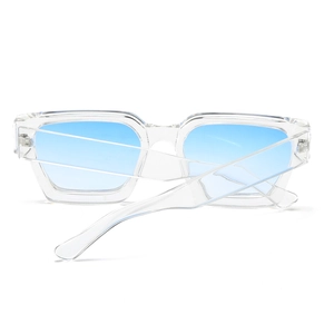 Rear view of trendy thick square sunglasses with clear frame and blue gradient lenses