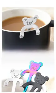 Macro shot of 304 stainless steel coffee spoons with cute bear designs in silver and black