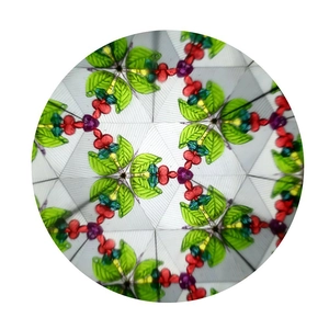 Internal view of a classic kaleidoscope showing colorful beads in a geometric pattern