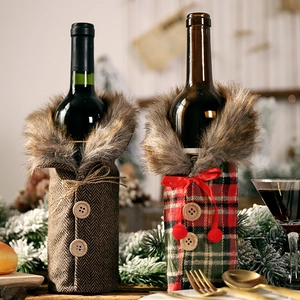 Detail of Christmas wine bottle covers with faux fur collars and decorative buttons