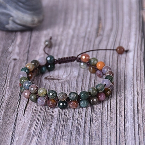 Detail of bohemian double-layer faceted Indian agate beads on hand-woven brown cord