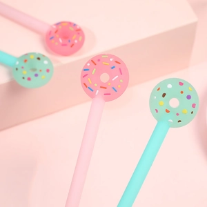 Cute donut style gel pens in pink and mint green with colorful sprinkles detail