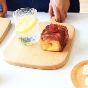Rectangular Japanese beech wood cutting board with handle for bread and fruit serving