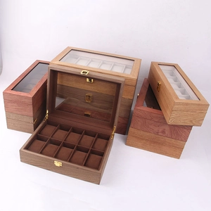 Vintage wooden watch organizer with glass lid and multiple slots in walnut and oak finish