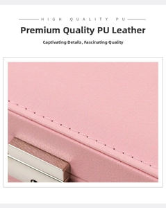 Detail of pink PU leather jewelry box with high-quality stitching and metal buckle
