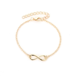 Elegant gold infinity symbol chain bracelet with adjustable lobster clasp on white background