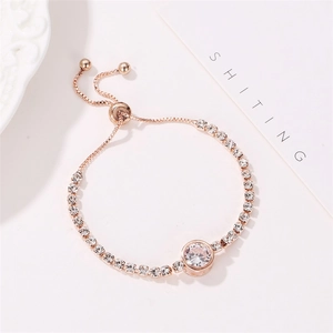 Detail of rose gold bolo bracelet with sparkling zircon pavé and adjustable sliding clasp
