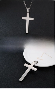 Polished stainless steel cross pendant featuring a smooth metallic finish and twist chain