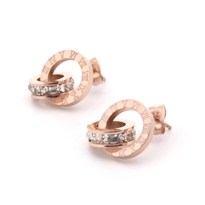 Boucles d'oreilles doubles anneaux or rose avec chiffres romains et cristaux brillants