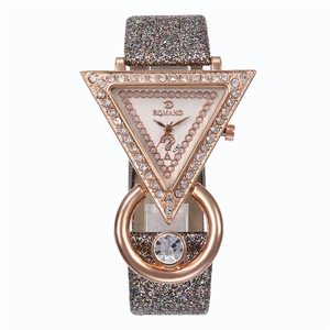 Detail of rose gold triangle watch with rhinestone inlay and colorful sequin strap