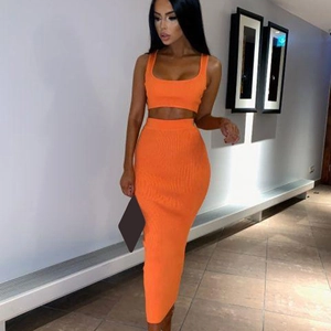 Orange two-piece knitted set for women featuring a cropped tank top and maxi bodycon skirt