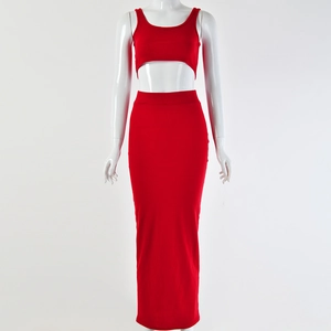 Detailed texture of red knitted sleeveless crop top and high waist slim fit maxi skirt
