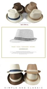 Detailed view of woven texture and colorful grosgrain ribbons on summer straw fedora hats