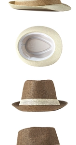 Detail view of woven straw fedora hats showing inner sweatband and size 58 label
