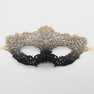 Elegant black and gold lace masquerade mask for Halloween parties and fancy dress events