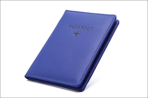 Blue RFID leather passport cover with embossed plane icon and passport text on white background