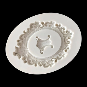 Baroque oval silicone mold with floral relief border and harp design for fondant crafting
