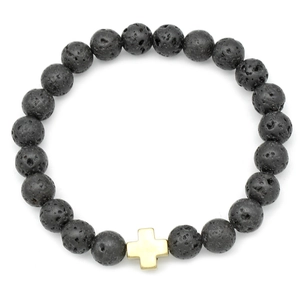 Detail of porous black lava stone beads and a smooth golden cross charm bracelet