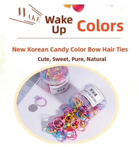 Pot de chouchous colorés pour enfants avec petits nœuds pour coiffure douce