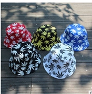 Top view of reversible bucket hats with weed leaf patterns in five different colors