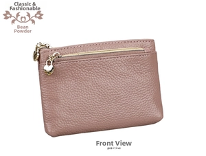 Close-up of dusty pink lychee grain leather coin purse with double heart-shaped zippers