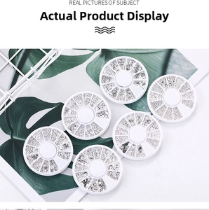 Detail of 6-pack silver nail art metal rivets set with stars and rings in round cases