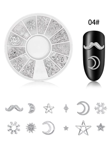 Silver metal nail art studs featuring moon and star shapes in a 12-slot storage box