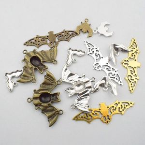 Assorted vintage alloy bat pendants in antique gold and silver for DIY jewelry making