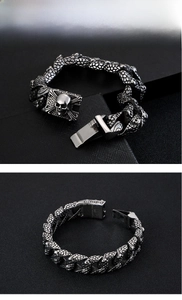 Macro view of 316L stainless steel skull clasp and dragon scale texture chain bracelet