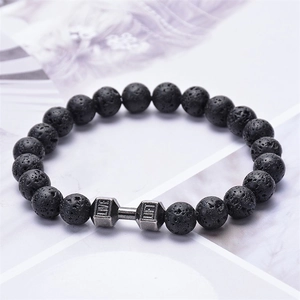 Close-up of black lava stone beads and silver dumbbell charm with Live Lift engraving