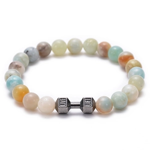 Detail of barbell dumbbell charm with LIVE LIFT engraving on stone beaded bracelet